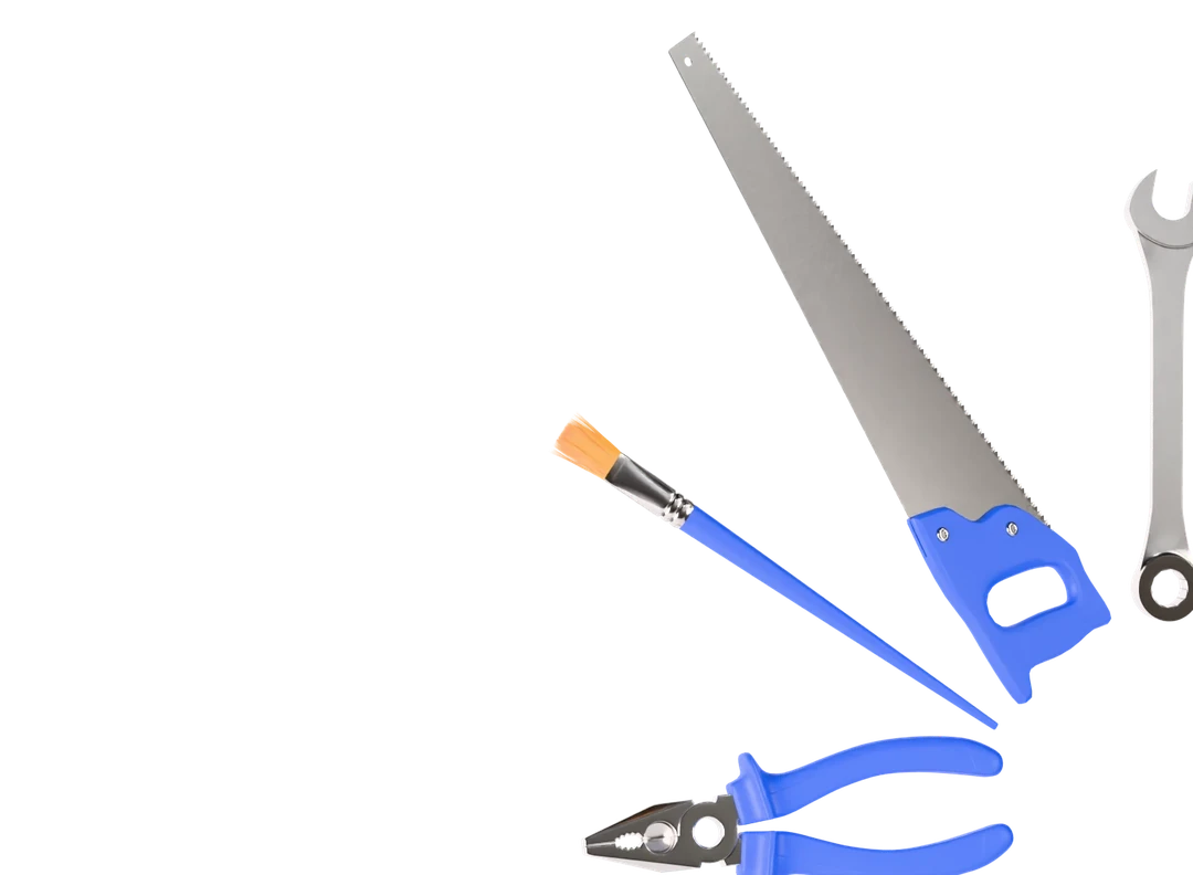 Werkzeuge: Pinsel, Säge, Schraubenschlüssel und Zange
